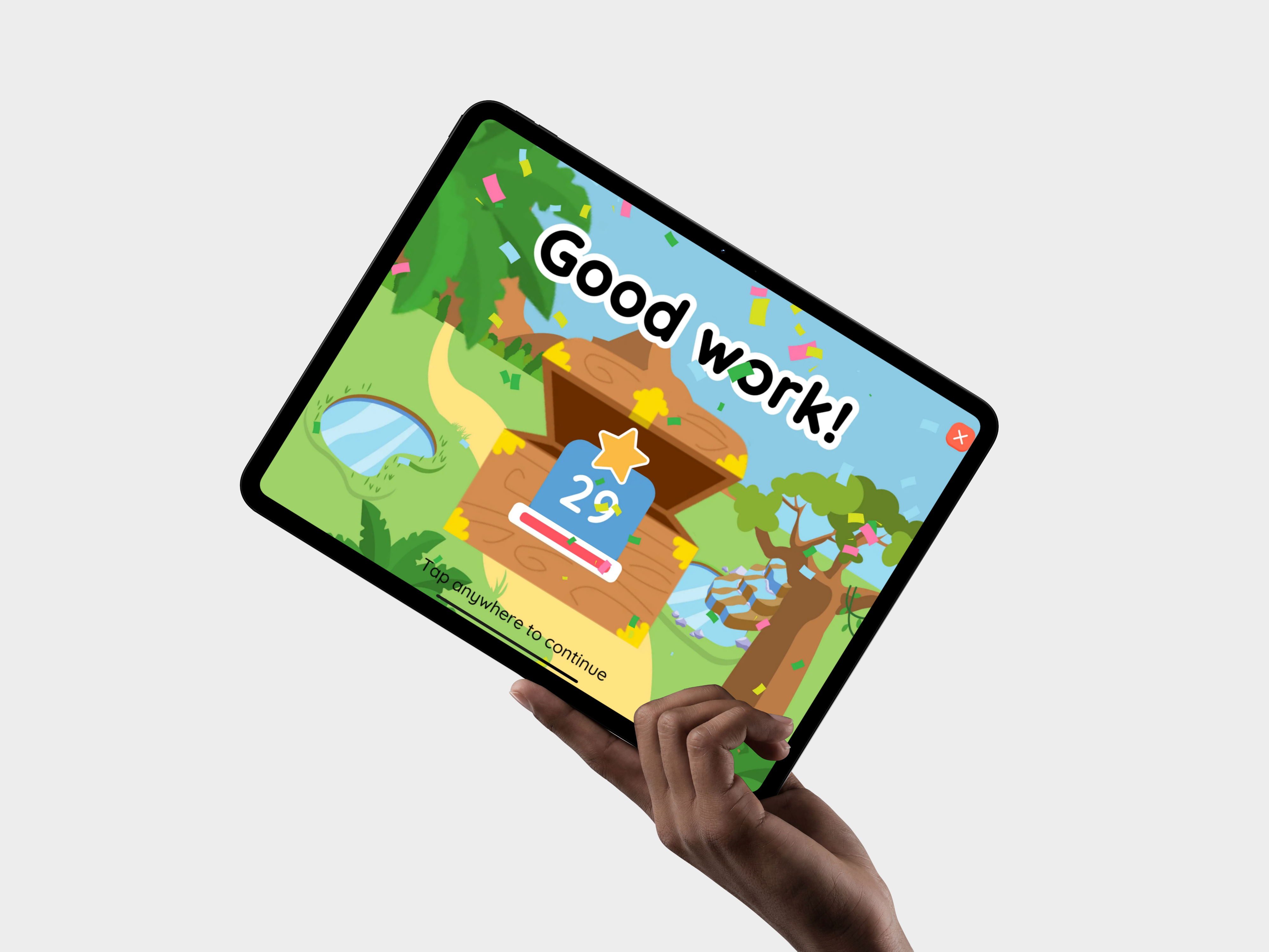 Bamba Learn game displayed on a tablet held in one hand