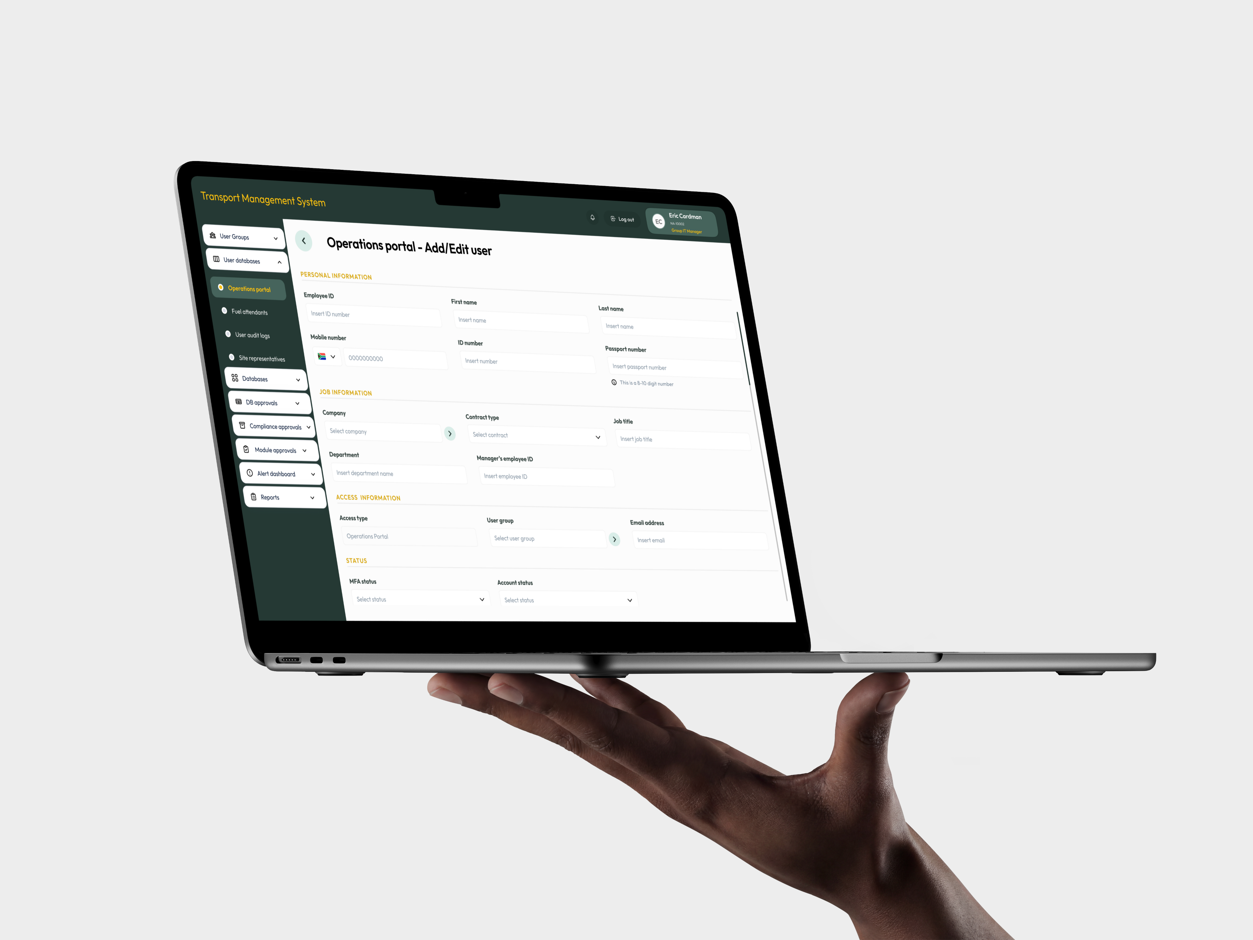 Transport Management System displayed on a laptop held in one hand